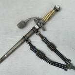 LW Dague Mdle 1937 , dragonne et bélière 