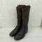 Paire de bottes officier a lacets en cuir marron 