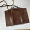 Porte cartes type' liseuse' cuir marron et sangle 
