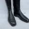 SS Paire de bottes officier cuir noir et embouchoirs bois 
