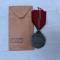 WH Médaille de l'est 1941/42 et sachet 