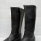 WH Paire de bottes cloutées troupe cuir noir 