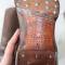 WH Paire de bottes troupe cloutées cuir marron 