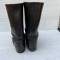 WH Paire de bottes troupe cloutées cuir noir 